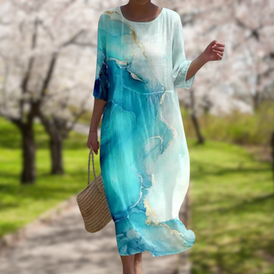 Alma | Elegant kjole med effekt som dekker magen